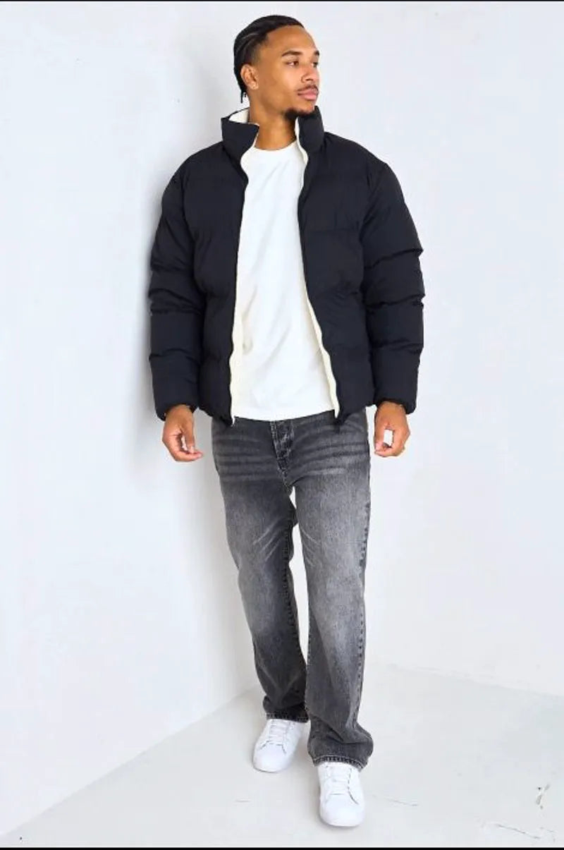 Reversible black down jacket with white shearling interior