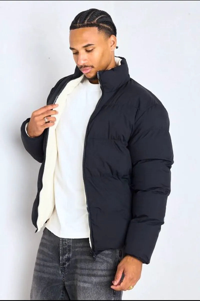 Reversible black down jacket with white shearling interior