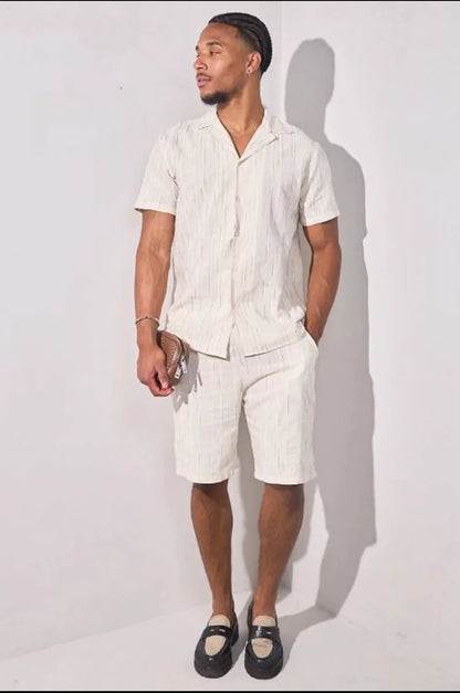 Beige two-piece set with embroidered green striped shirt and shorts