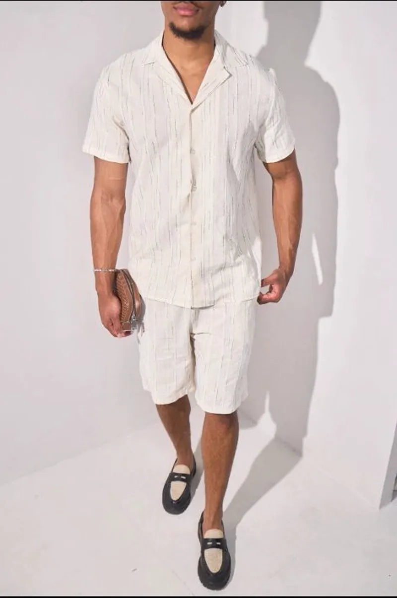 Beige two-piece set with embroidered green striped shirt and shorts