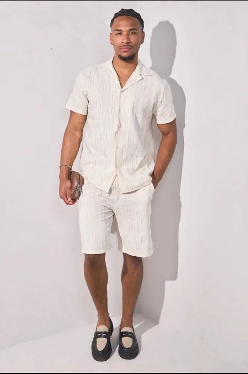 Beige two-piece set with embroidered green striped shirt and shorts