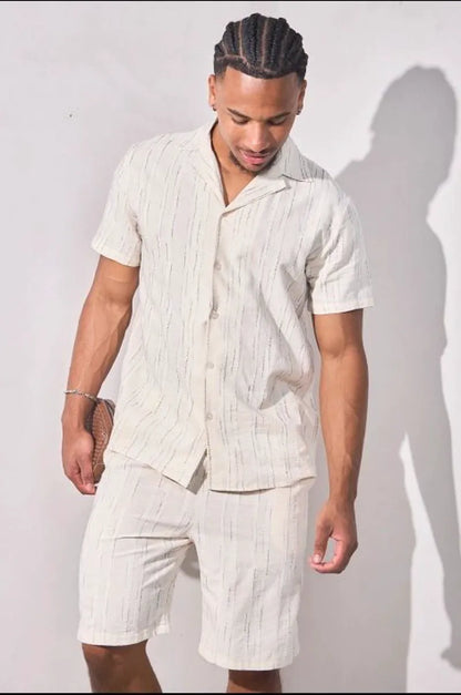 Beige two-piece set with embroidered green striped shirt and shorts