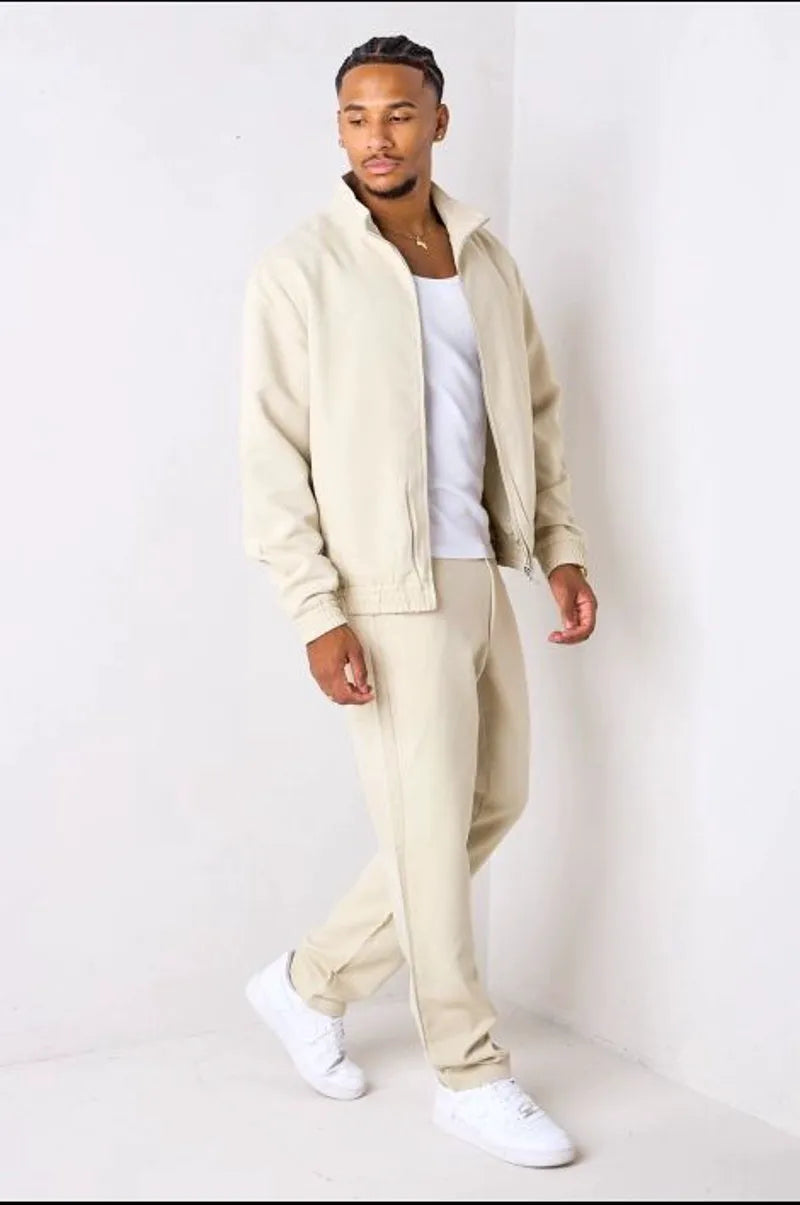 Beige two-piece set: zip-up jacket + trousers