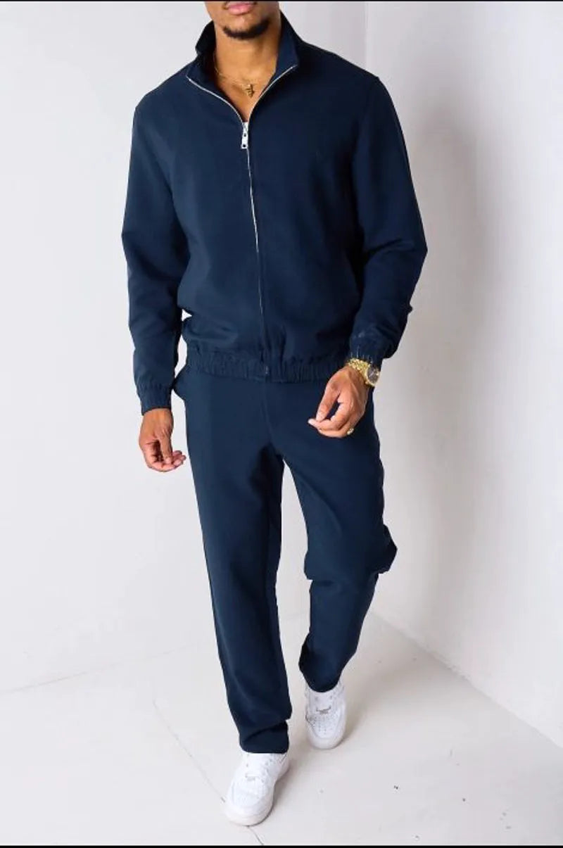 Navy blue two-piece set: zip-up jacket + trousers