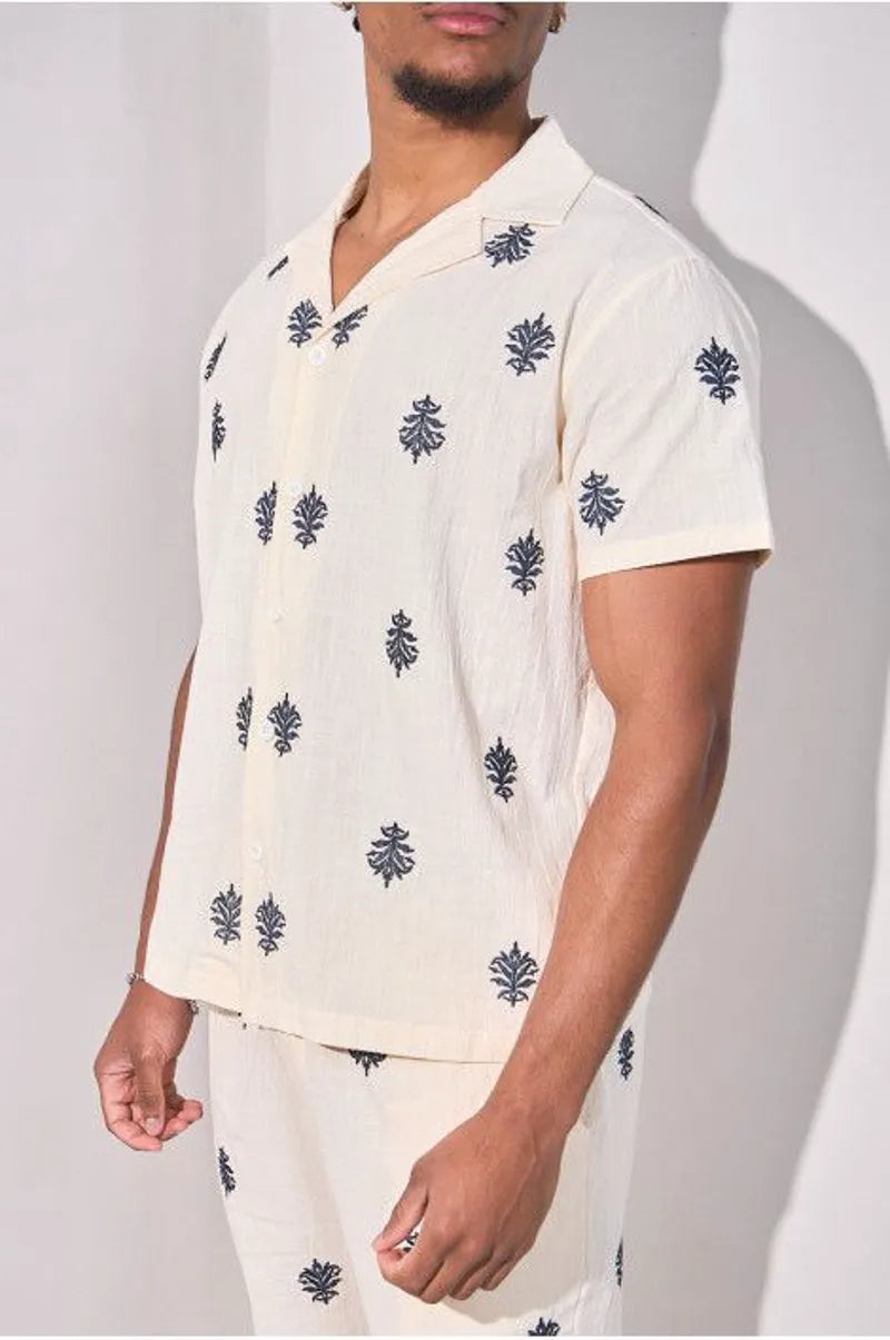 Two-piece ensemble with embroidered linen-effect shirt and beige trousers