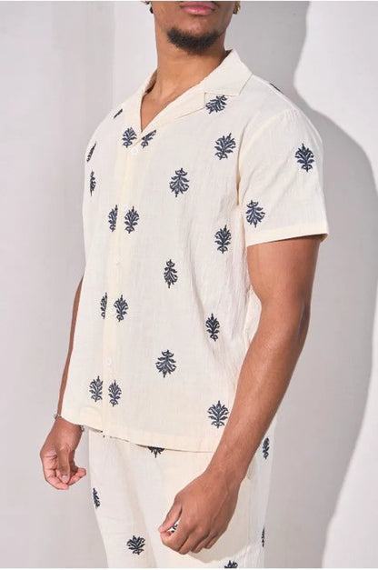 Two-piece ensemble with embroidered linen-effect shirt and beige trousers