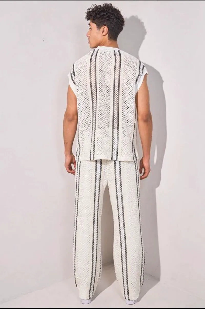 Two-piece knit ensemble: sleeveless top + white trousers