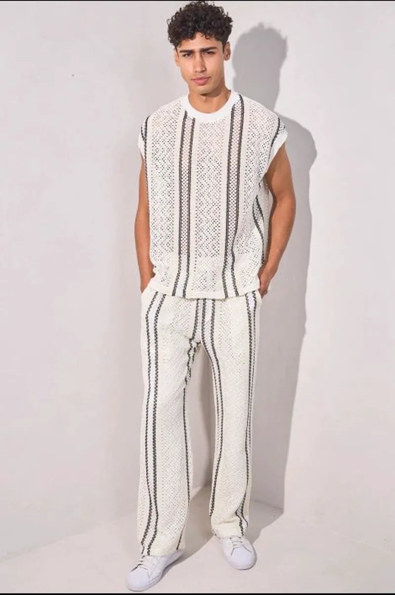 Two-piece knit ensemble: sleeveless top + white trousers