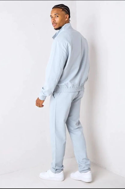 Two-piece ensemble: gray zip-up jacket + trousers