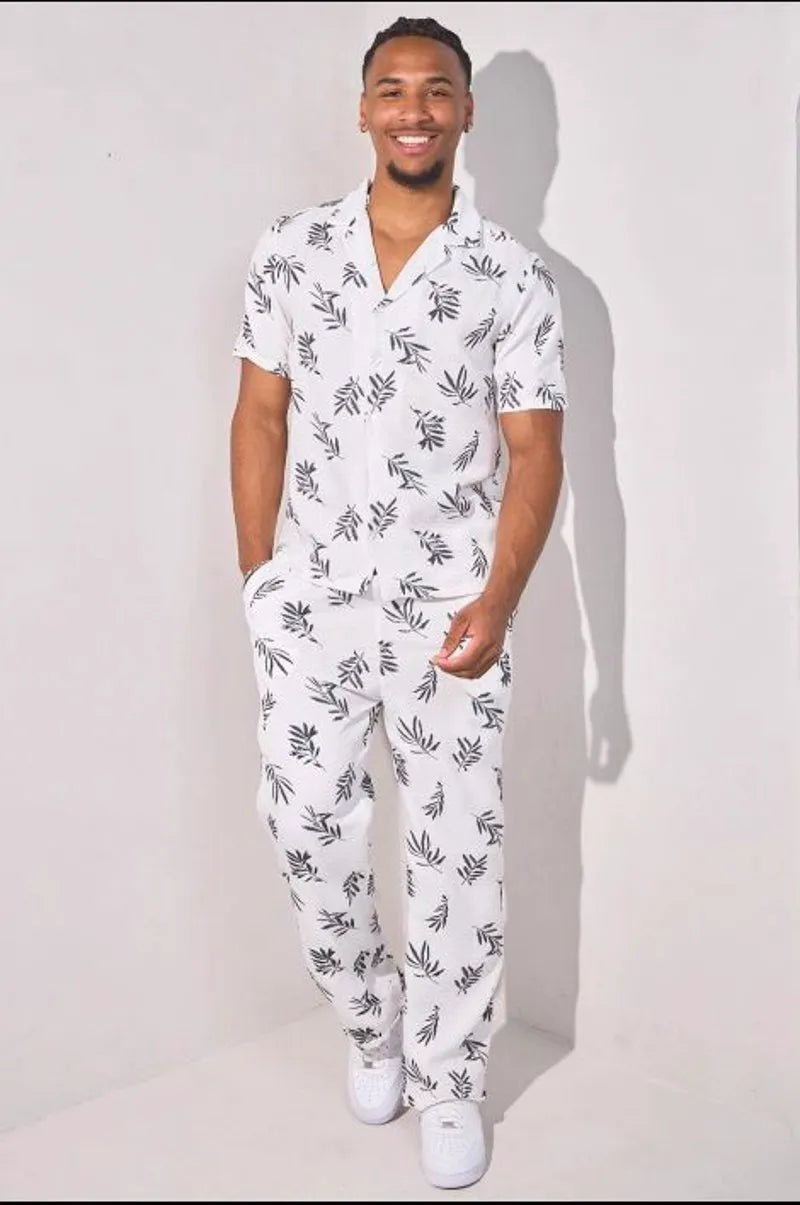 Two-piece set: leaf print shirt + white trousers