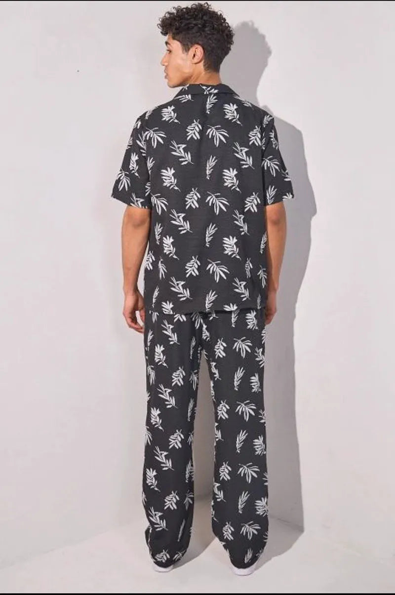 Two-piece set: leaf print shirt + black trousers