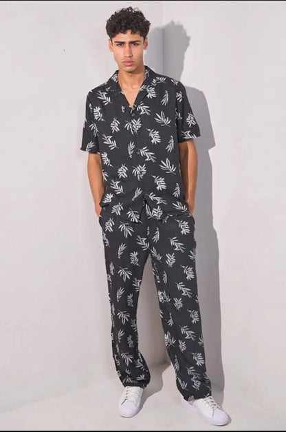 Two-piece set: leaf print shirt + black trousers
