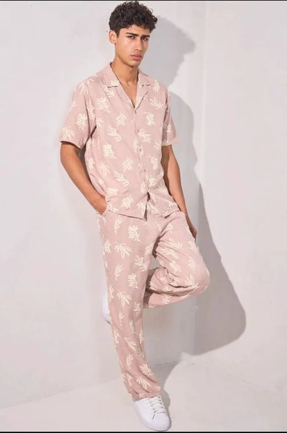 Two-piece set with leaf print shirt and pink trousers