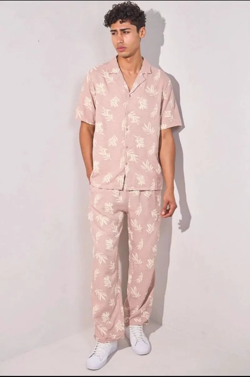 Two-piece set with leaf print shirt and pink trousers