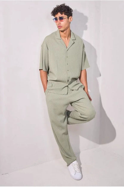 Two-piece ensemble in khaki with striped dual-texture shirt and trousers.