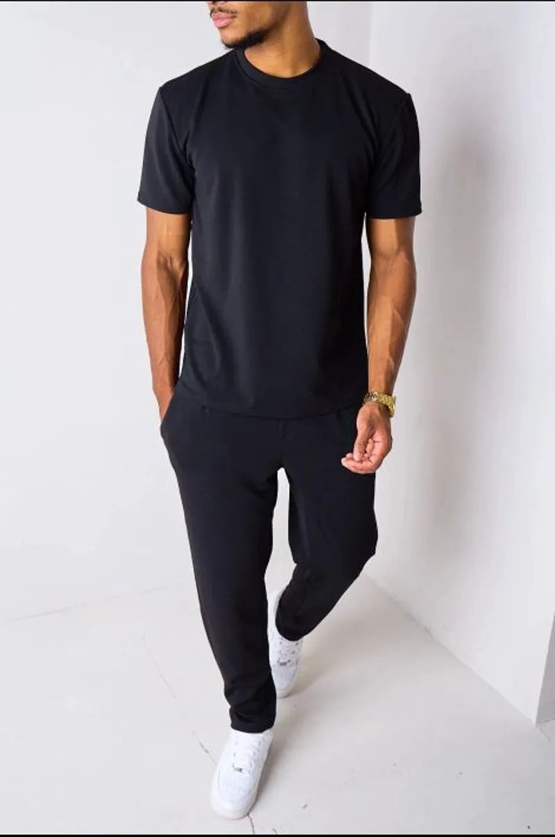 Black piqué knit two-piece set: top + trousers