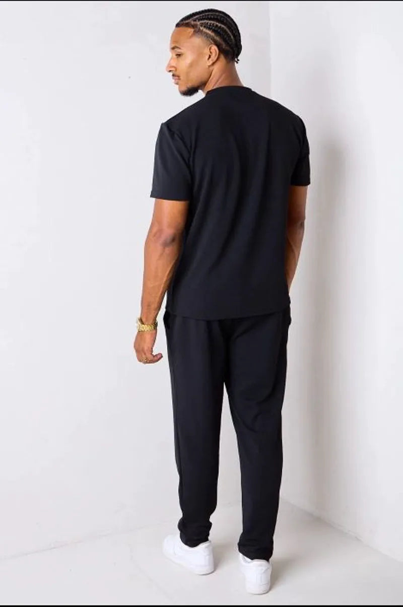 Black piqué knit two-piece set: top + trousers