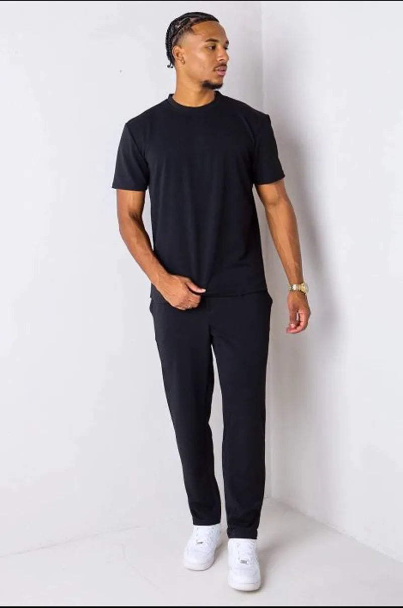 Black piqué knit two-piece set: top + trousers
