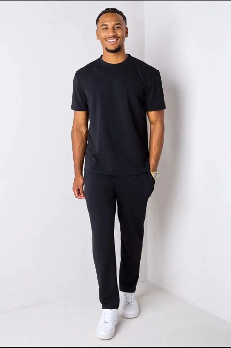 Black piqué knit two-piece set: top + trousers