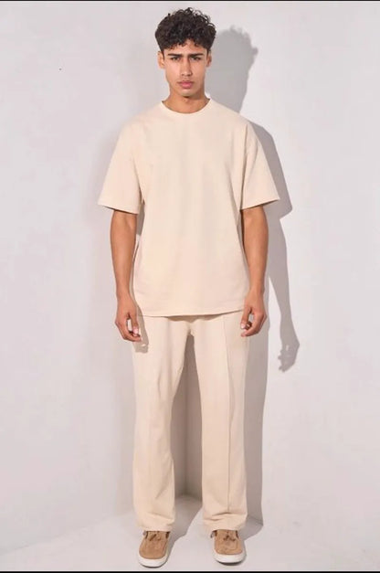 Two-piece ensemble: beige t-shirt and trousers