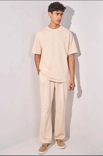 Two-piece ensemble: beige t-shirt and trousers
