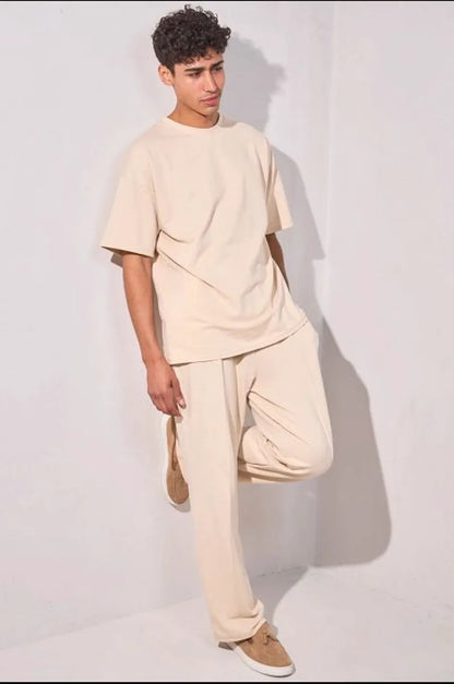 Two-piece ensemble: beige t-shirt and trousers