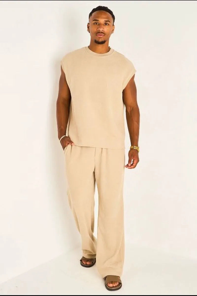 Ensemble deux pièces beige foncé haut sans manches + pantalon effet maille