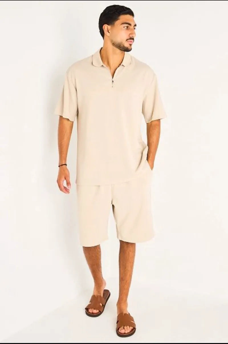 Ensemble deux pièces beige haut + short à motifs chevrons