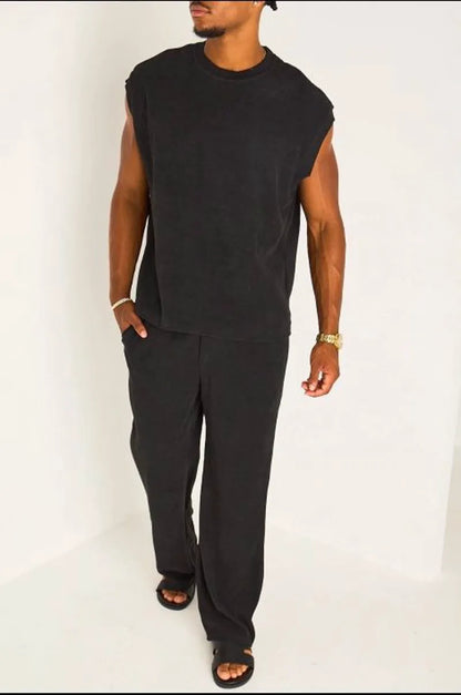Ensemble deux pièces noir haut sans manches + pantalon effet maille