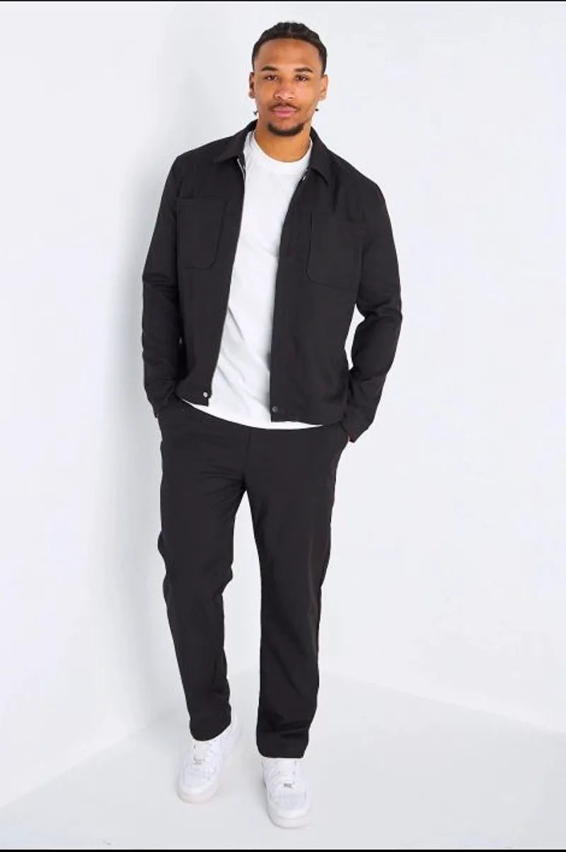 Ensemble deux pièces noir veste à col rabat + pantalon coupe droite