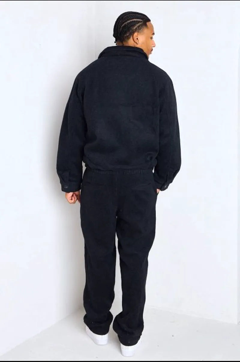 Black two-piece ensemble: jacket + trousers