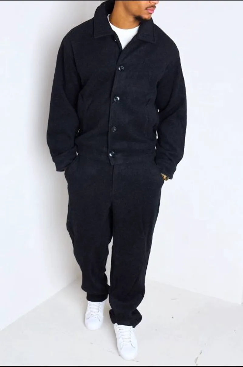 Black two-piece ensemble: jacket + trousers