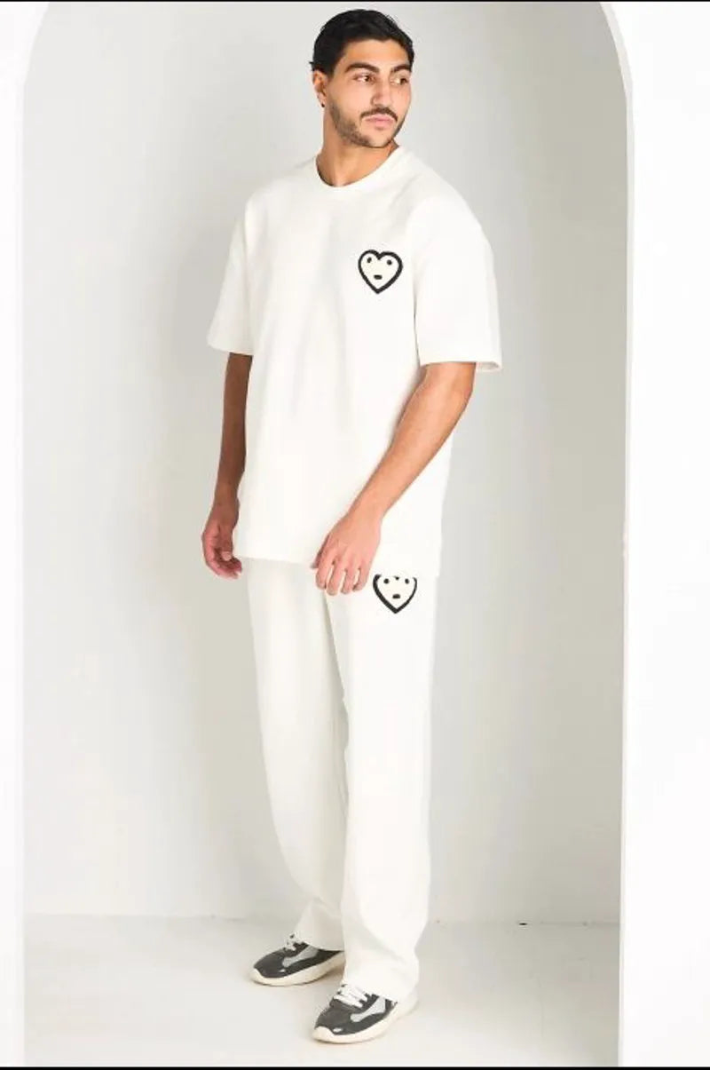 Ensemble blanc haut + pantalon avec broderies