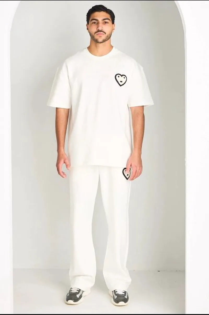 Ensemble blanc haut + pantalon avec broderies