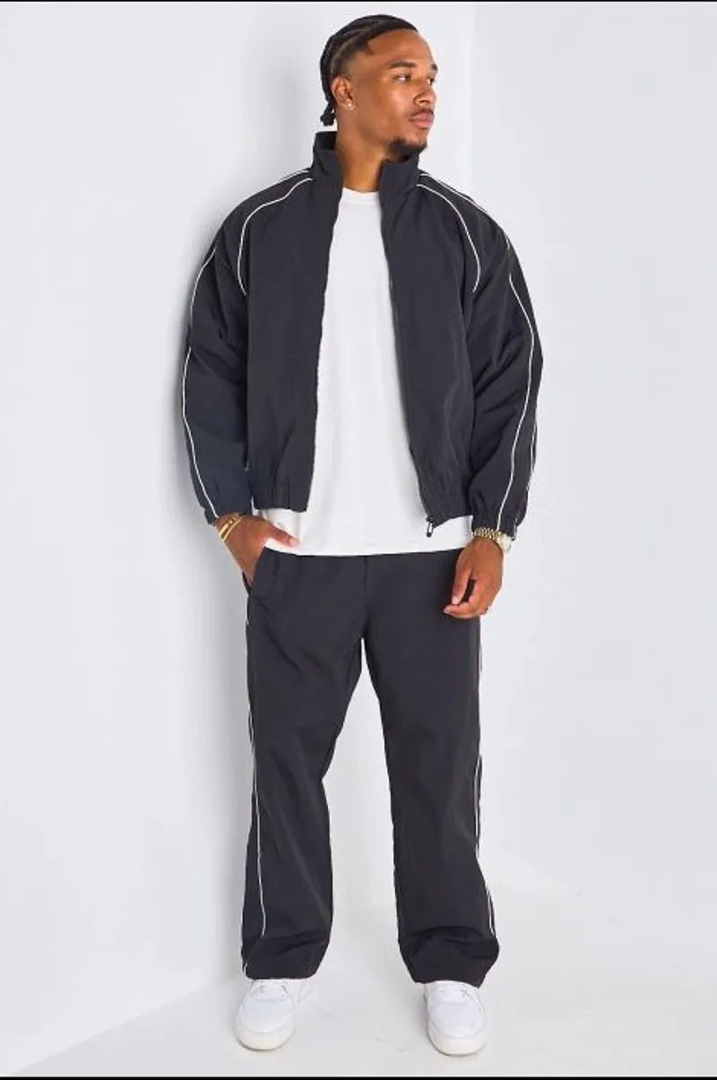 Ensemble survêtement deux pièces noir à bandes blanches veste + jogging
