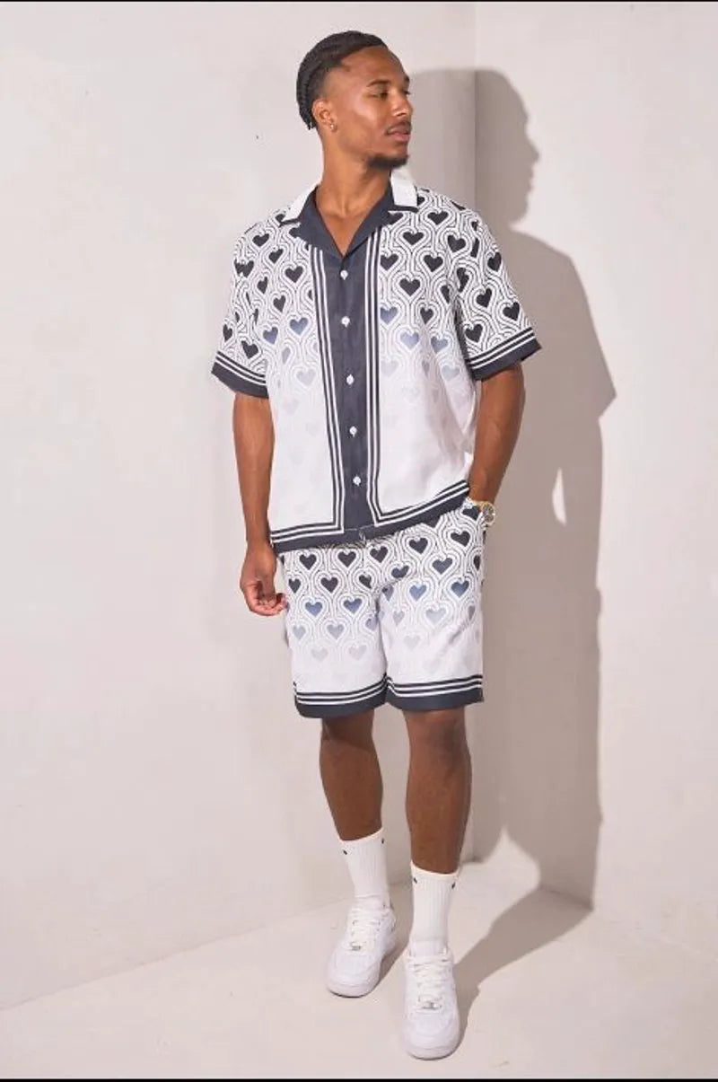 Two-piece heart print ensemble: black and white shirt + shorts