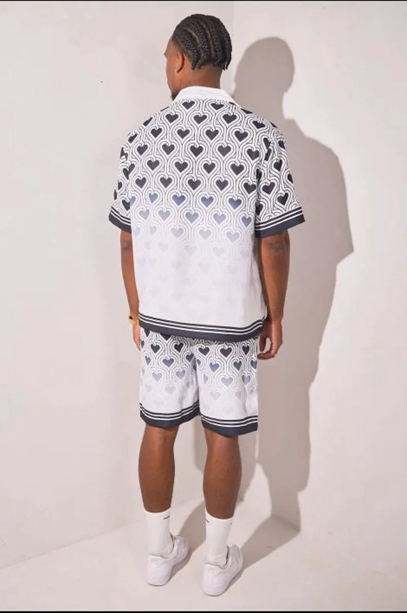 Two-piece heart print ensemble: black and white shirt + shorts
