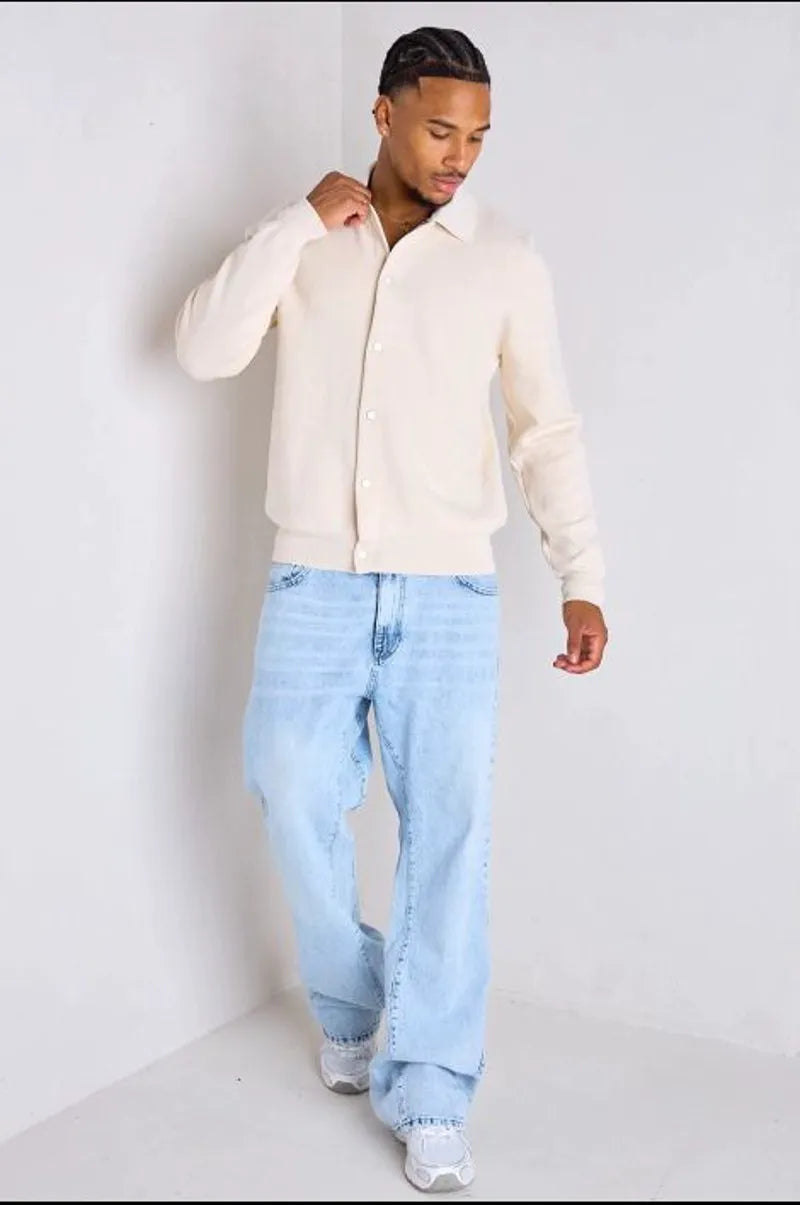 Beige sweater vest with fold-over collar
