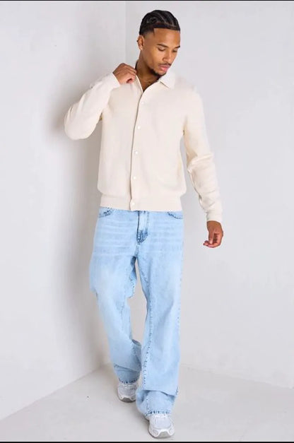 Beige sweater vest with fold-over collar