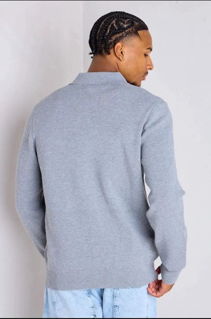Gray sweater vest with a fold-over collar
