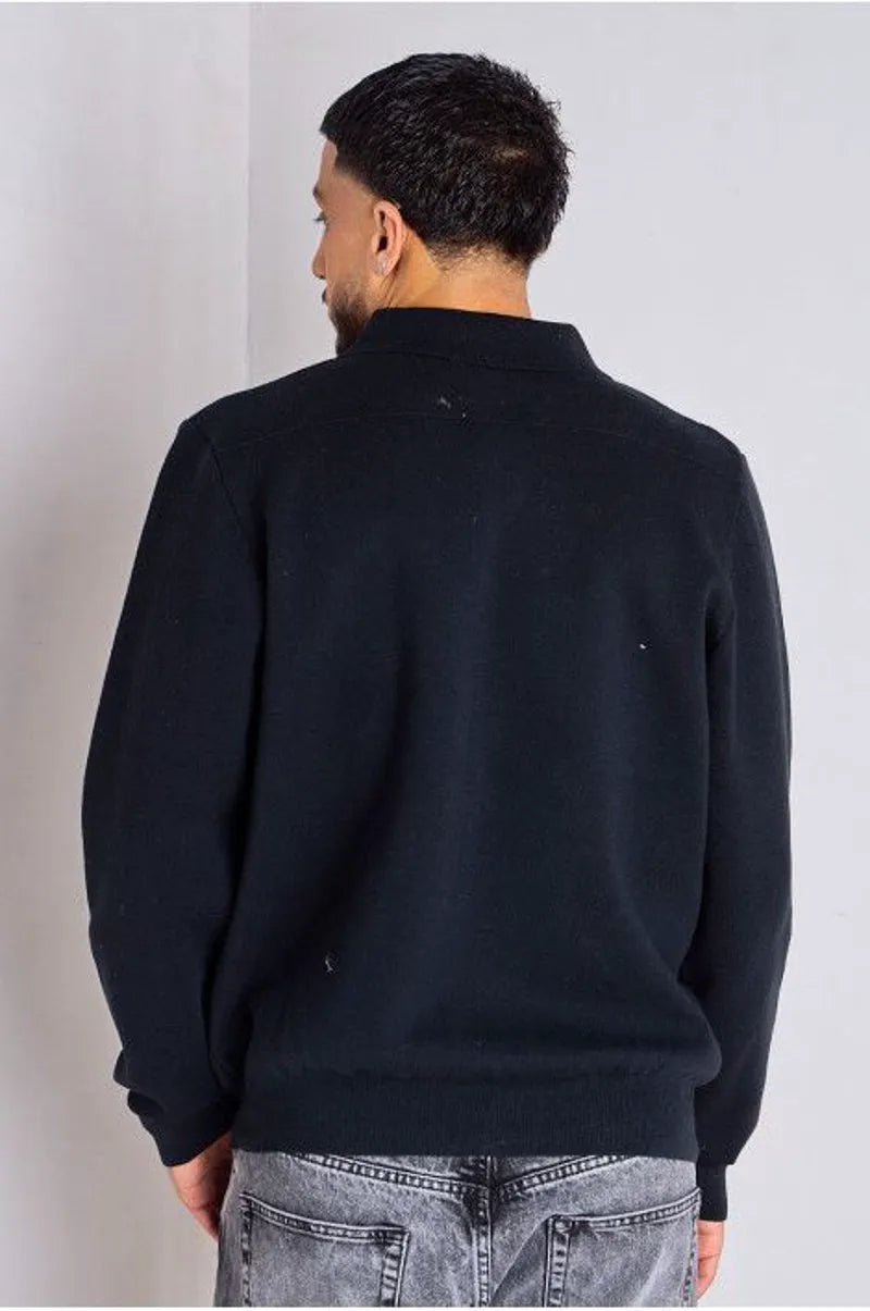 Black sweater vest with fold-over collar