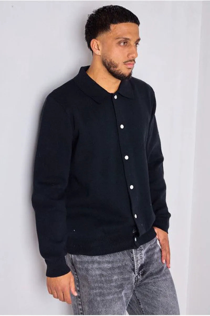 Black sweater vest with fold-over collar