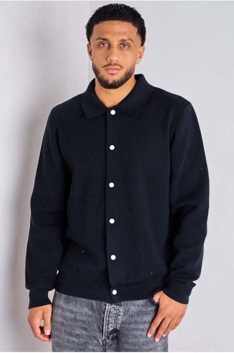 Black sweater vest with fold-over collar