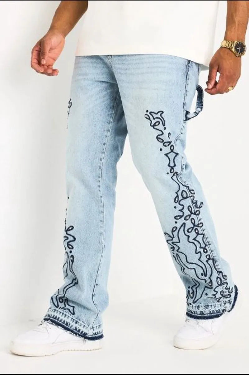 Jean bleu clair à motifs arabesques
