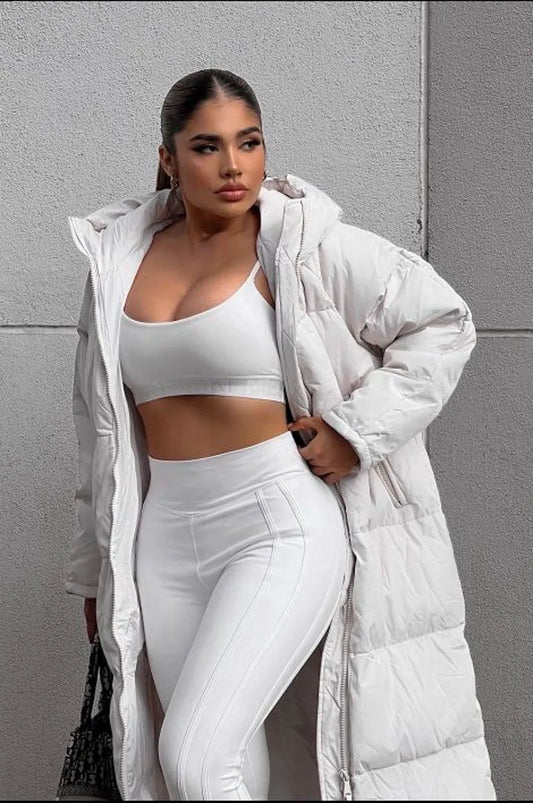 Long beige quilted down coat with double zipper closure