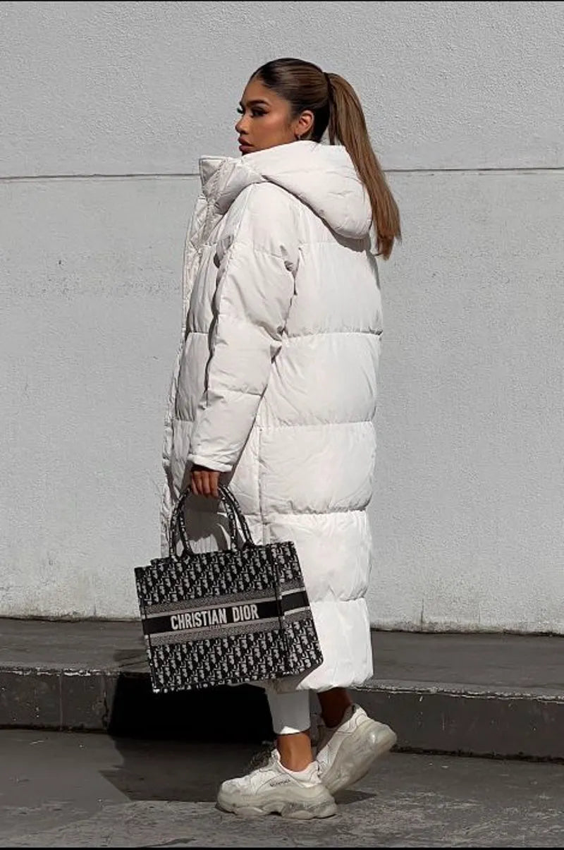 Long beige quilted down coat with double zipper closure