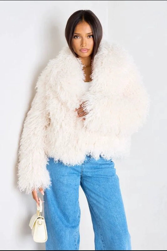 Short white coat with long curly fur