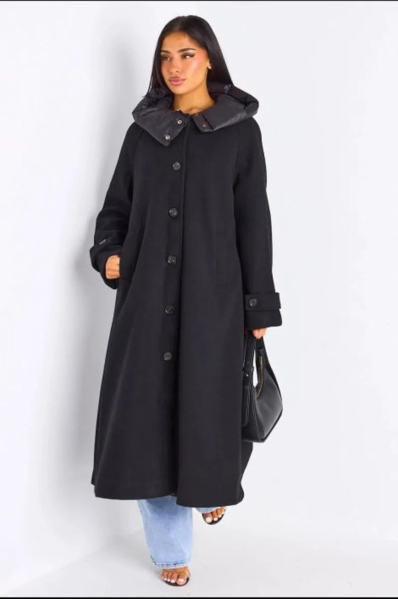 Manteau long texturé noir à capuche bi-matière