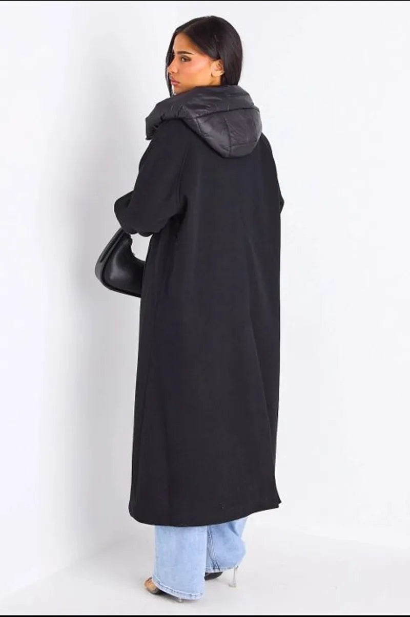 Manteau long texturé noir à capuche bi-matière