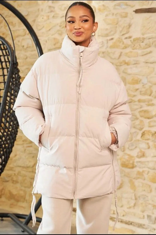 Mid-length quilted beige down jacket